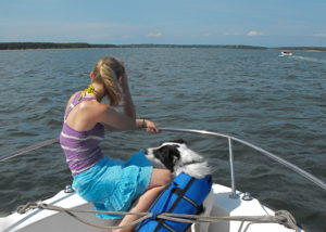 Woman_with_a_dog_on_a_boat-17July2009